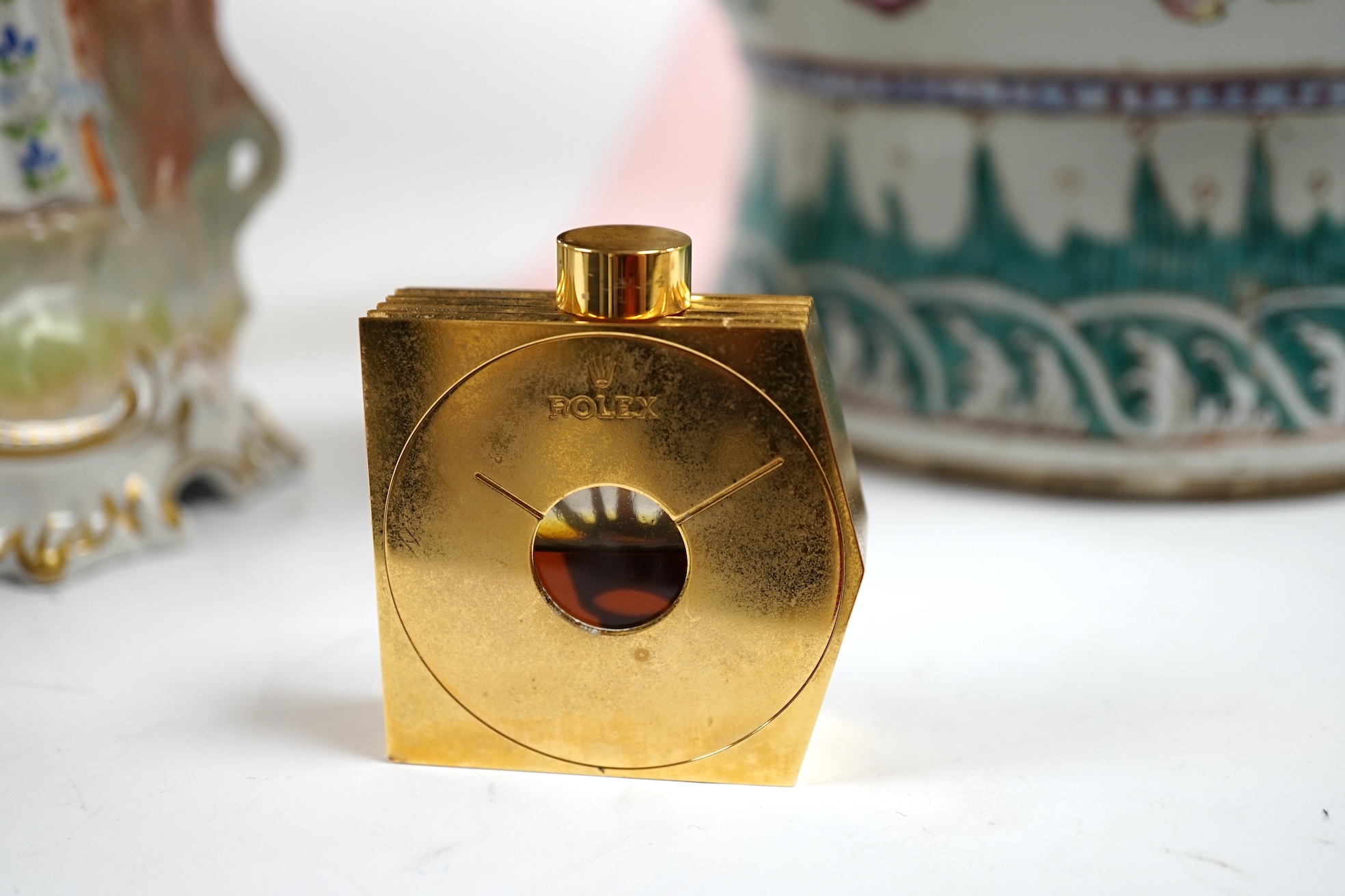 A Rolex “Perpetually Yours” enamelled scent bottle, boxed. Condition - fair to good